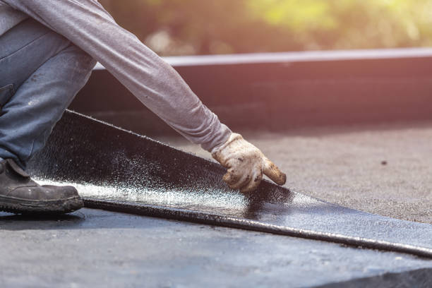 Professional Waterproofing technician working in Hebron, IL